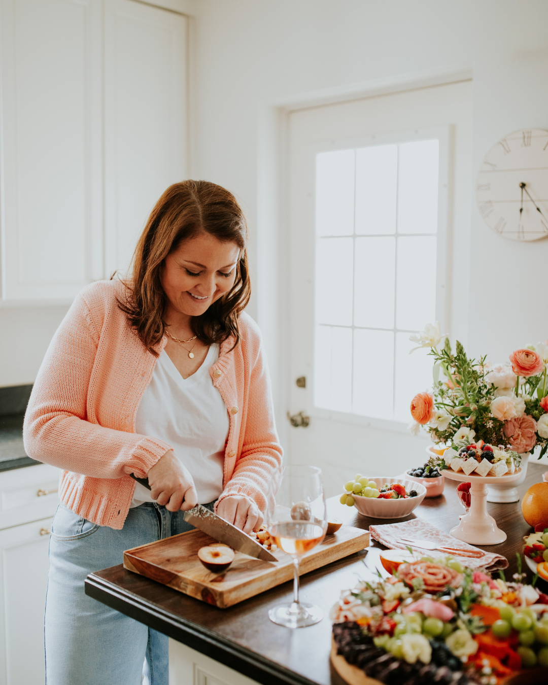 Brieanne Rogus, founder of CharcuterieBrie, creating botanically inspired charcuterie boards and grazing tables for Chicago and the western suburbs